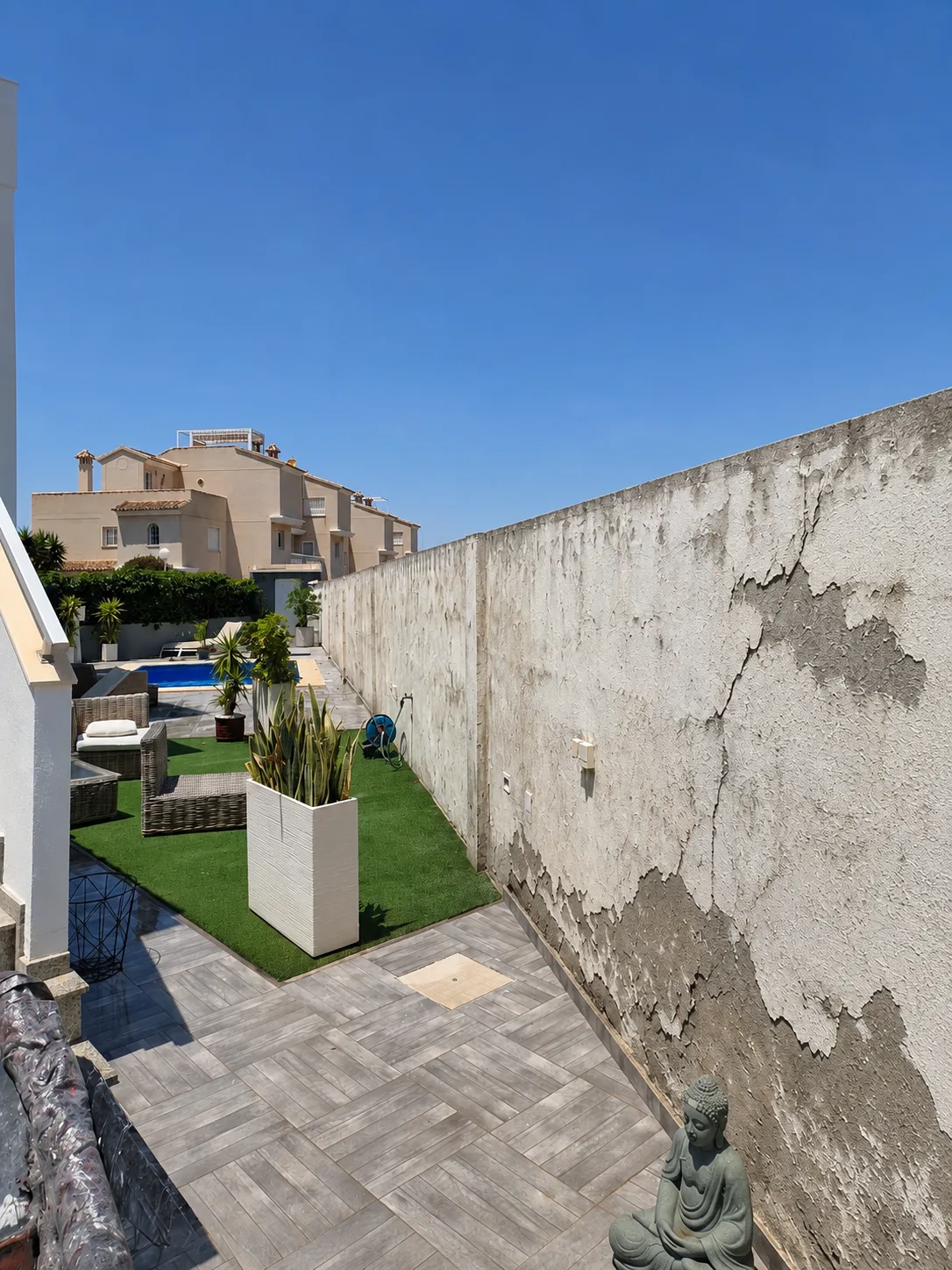 Before: Wall repairs & rendering
