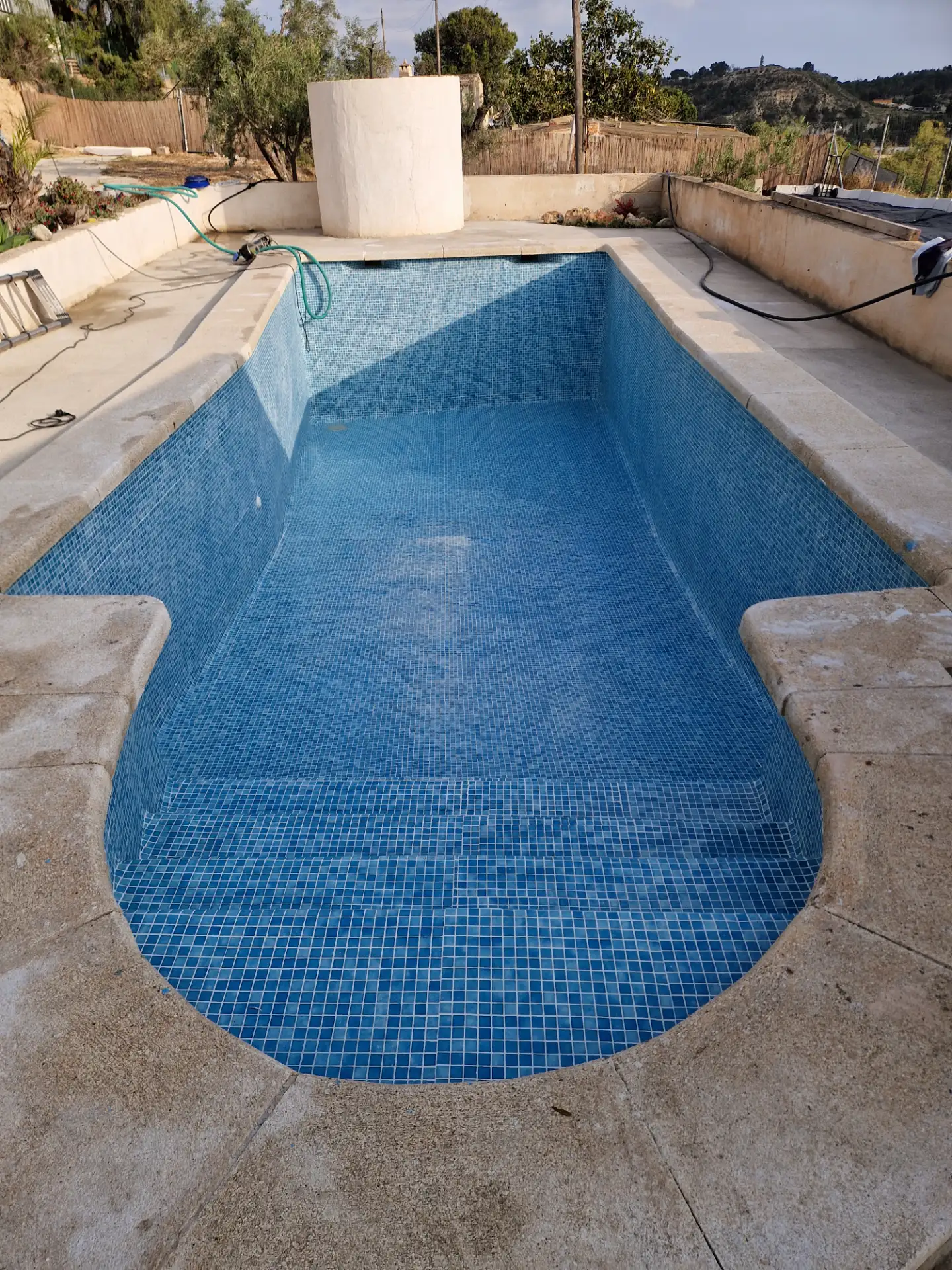 After: Pool refurbishment — completely retiled — carried out by Handwerker Costa Blanca