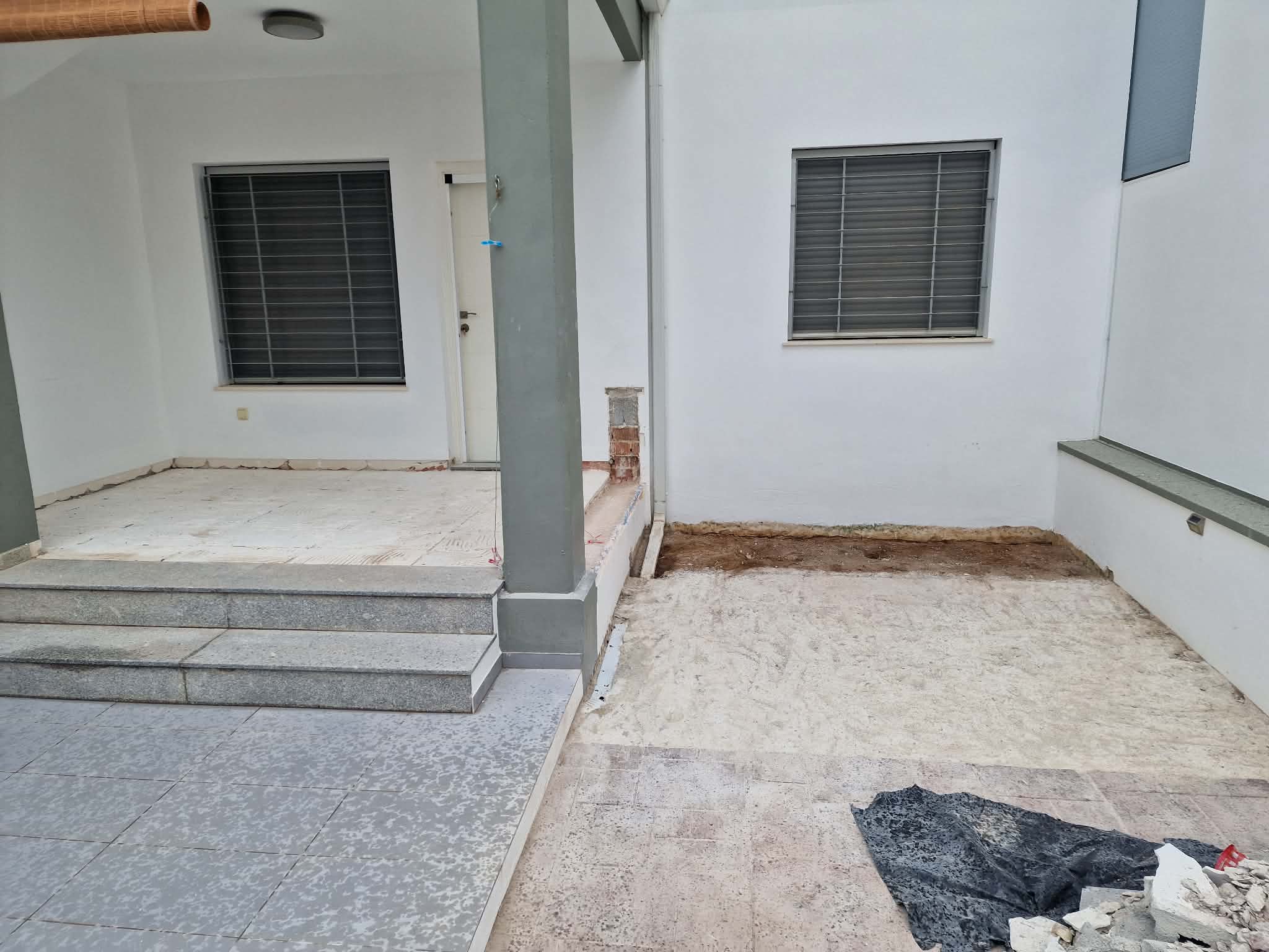Before: Terrace with lighting & planting bed